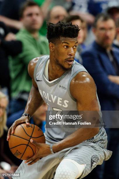 Jimmy Butler of the Minnesota Timberwolves handles the ball against the Denver Nuggets during the game on April 11, 2018 at the Target Center in...