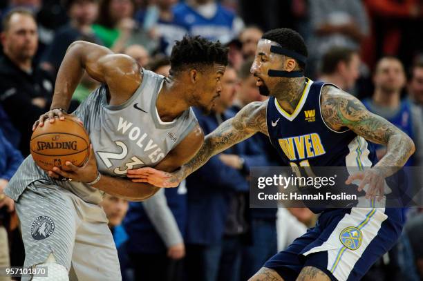 Wilson Chandler of the Denver Nuggets defends against Jimmy Butler of the Minnesota Timberwolves during the game on April 11, 2018 at the Target...