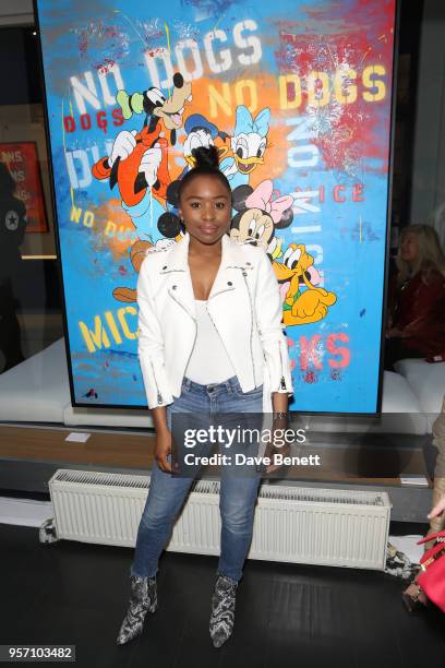 Tinea Taylor attends Once Upon A Time by contemporary Irish street artist Robyn Ward on May 10, 2018 in London, England.