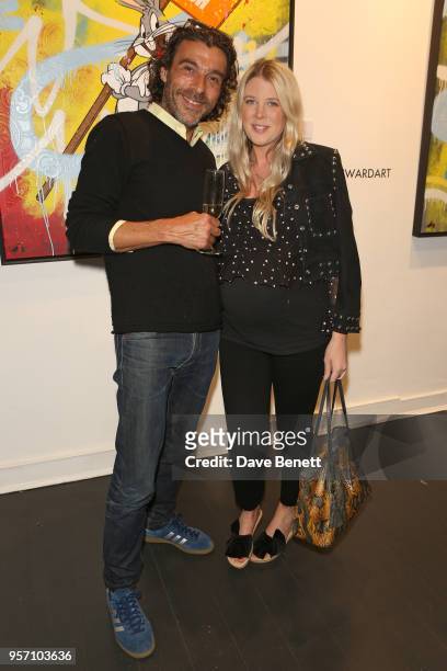 Derrick Santini and Gracie Egan attend Once Upon A Time by contemporary Irish street artist Robyn Ward on May 10, 2018 in London, England.