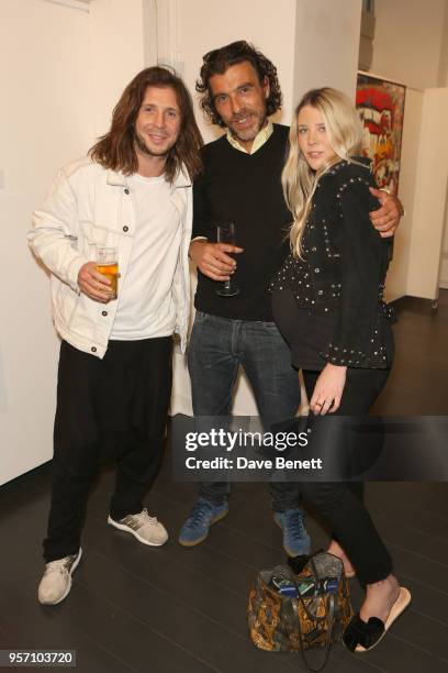 Robyn Ward, Derrick Santini and Gracie Egan attend Once Upon A Time by contemporary Irish street artist Robyn Ward on May 10, 2018 in London, England.