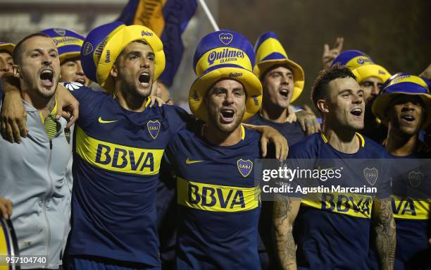 Dario Benedetto, Emmanuel Mas, Julio Buffarini and Nahitan Nández of Boca Juniors celebrate after winning the Superliga 2017/18 at Estadio Juan...