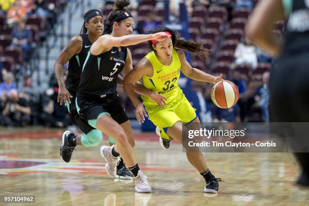 May 7: Loryn Goodwin of the Dallas Wings defended by Kia Nurse of the New York Liberty during the Dallas Wings Vs New York Liberty, WNBA pre season...