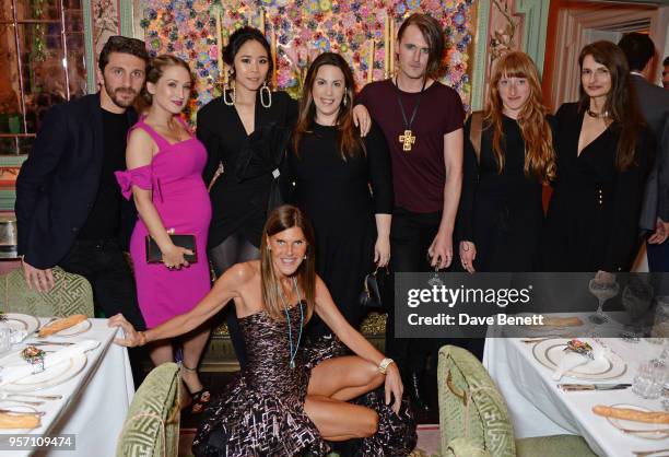Anna Dello Russo poses with designers David Koma, Sophia Webster, Nga Nguyen, Mary Katrantzou, Gareth Pugh, Molly Goddard and Alessandra Rich attend...