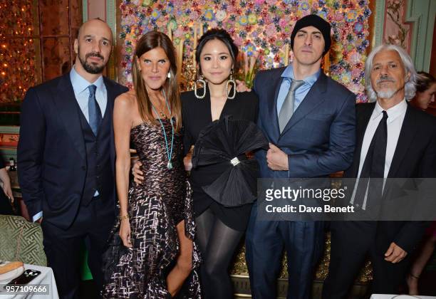 Anna Dello Russo, Nga Nguyen, Bebe Moratti and Antonio Padula attend a private dinner to celebrate the launch of "AdR Book: Beyond Fashion", a new...