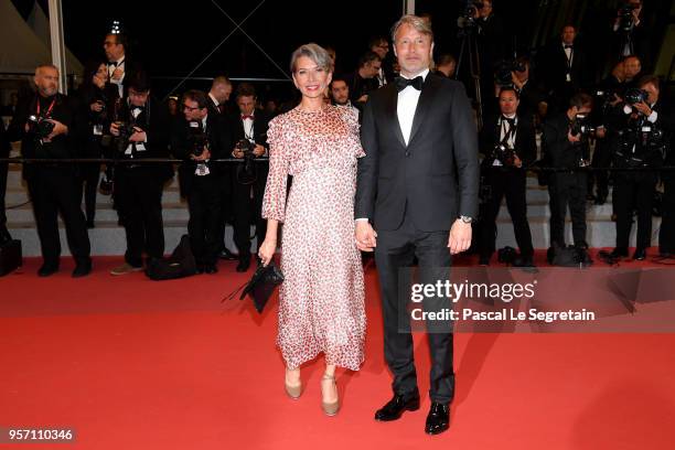 Hanne Jacobsen and Mads Mikkelsen attends the screening of "Arctic" during the 71st annual Cannes Film Festival at Palais des Festivals on May 10,...