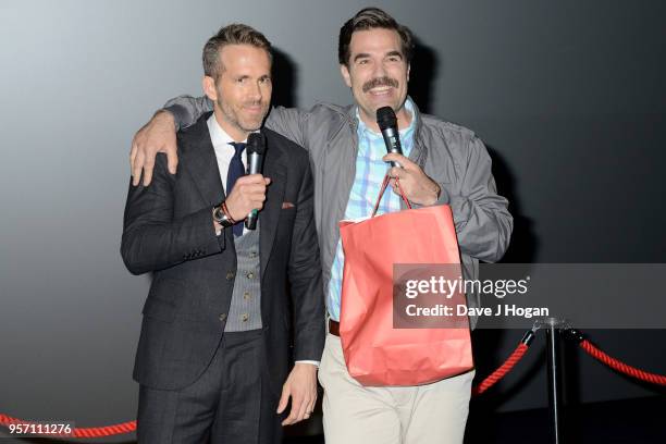 Ryan Reynolds and Rob Delaney attend the 'Deadpool 2' fan screening at Cineworld Leicester Square on May 10, 2018 in London, England.