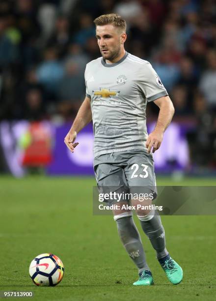 Luke Shaw of Manchester United runs with the ball during the Premier League match between West Ham United and Manchester United at London Stadium on...