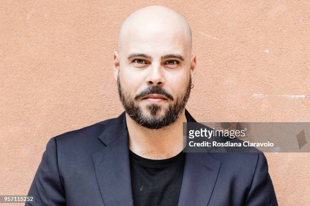 Italian actor Marco D'Amore poses on May 10, 2018 in Milan, Italy.