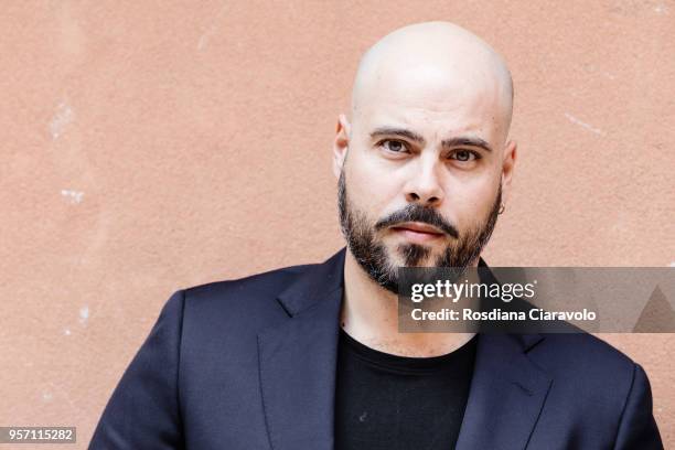 Italian actor Marco D'Amore poses on May 10, 2018 in Milan, Italy.