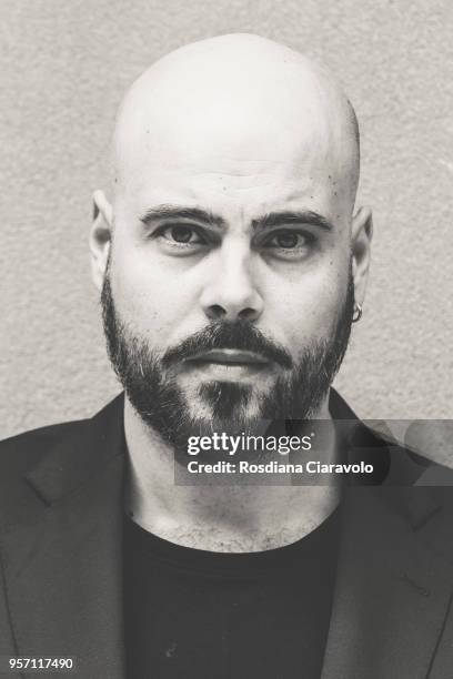 Italian actor Marco D'Amore poses on May 10, 2018 in Milan, Italy.