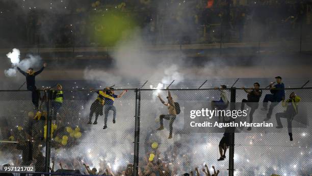 Fans of Boca Juniors cheer for their team during the celebration event after winning the Argentina Superliga 2017/18 at Estadio Alberto J. Armando on...