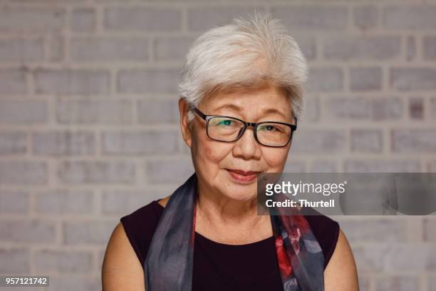mogen malaysisk kvinna - mature women portrait asian bildbanksfoton och bilder
