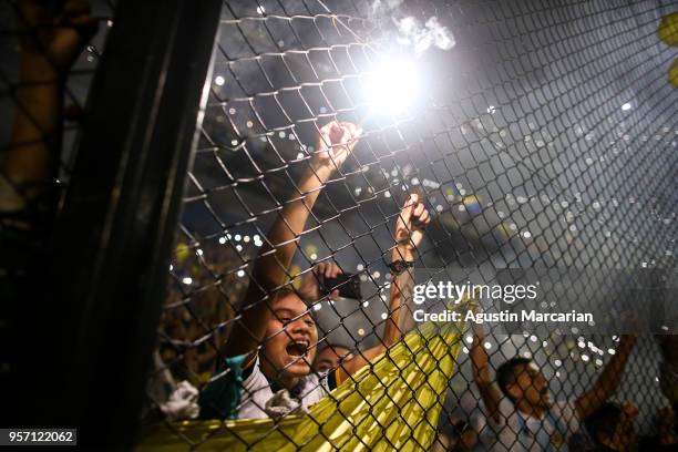 Fans of Boca Juniors cheer for their team during the celebration event after winning the Argentina Superliga 2017/18 at Estadio Alberto J. Armando on...