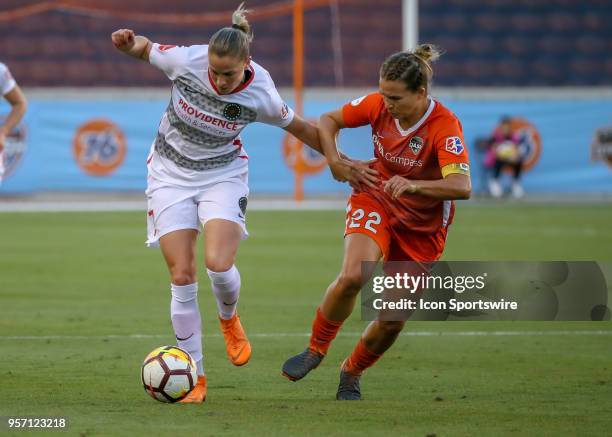 Portland Thorns FC Ana Maria Cmogorcevic and Houston Dash defender Amber Brooks fight for ball during the soccer match between the Portland Thorns...