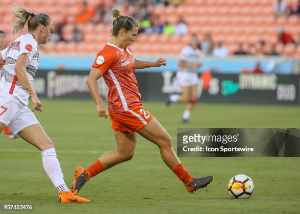 Houston Dash defender Amber Brooks reaches to trap the ball during the soccer match between the Portland Thorns and Houston Dash on May 9, 2018 at...