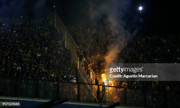 Fans of Boca Juniors light flares to cheer their team during the celebration event after winning the Argentina Superliga 2017/18 at Estadio Alberto...