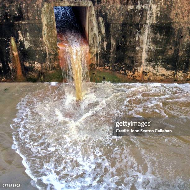 drainage canal in singapore - storm drain stock pictures, royalty-free photos & images