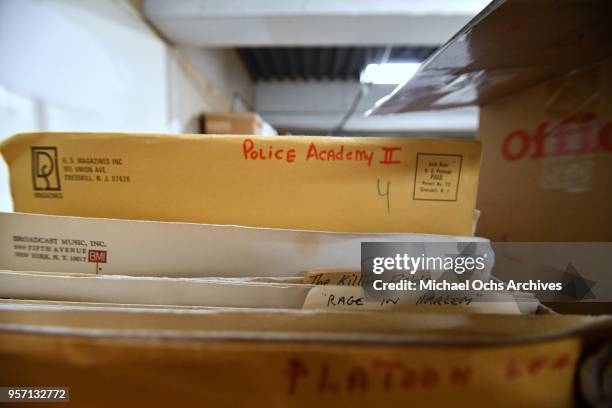 View of manila envelopes and folders that contain pictures of the movie "Police Academy II, The Killing Fields, Rage in Harlem" in the Michael Ochs...