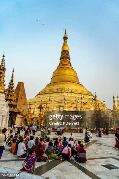 shwedagon pagoda, yangon,myanmar at dusk. - shwedagon pagoda stock pictures, royalty-free photos & images