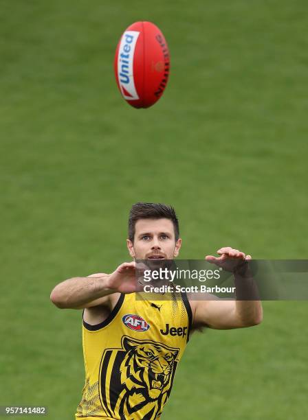 Trent Cotchin of the Tigers catches the ball during a Richmond Tigers AFL training session at Punt Road Oval on May 11, 2018 in Melbourne, Australia.