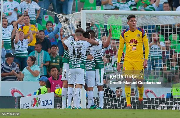 Osvaldo Martinez of Santos celebrates with teammates after scoring the opening goal during the semifinals first leg match between Santos Laguna and...