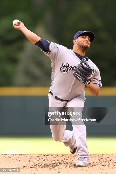 Starting pitcher Jhoulys Chacin of the Milwaukee Brewers throws in the first inning against the Colorado Rockies at Coors Field on May 10, 2018 in...