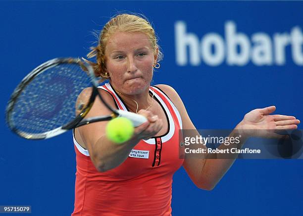 Alla Kudryavtseva of Russia plays a forehand in her second round singles match against Anabel Medina Garrigues of Spain during day five of the...
