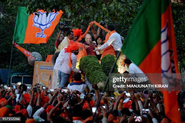 This photo taken on May 7, 2018 shows Bharatiya Janatha Party president Amit Shah during an election campaign rally in support of the party's local...