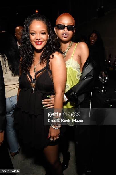 Rihanna and Slick Woods pose during the launch of Rihanna's global lingerie brand, Savage X Fenty at Villain on May 10, 2018 in New York City.