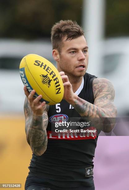 Jamie Elliott of the Magpies runs with the ball during a Collingwood Magpies AFL media session at the Holden Centre on May 11, 2018 in Melbourne,...