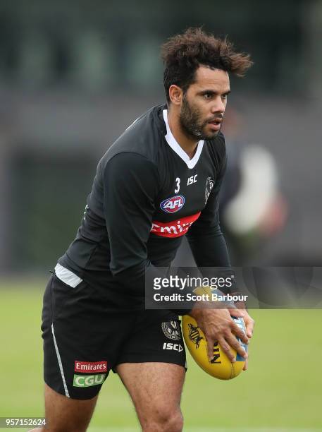 Daniel Wells of the Magpies runs with the ball during a Collingwood Magpies AFL media session at the Holden Centre on May 11, 2018 in Melbourne,...