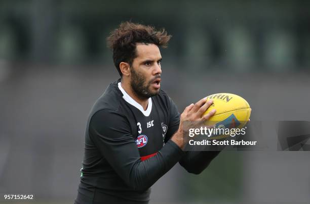 Daniel Wells of the Magpies runs with the ball during a Collingwood Magpies AFL media session at the Holden Centre on May 11, 2018 in Melbourne,...