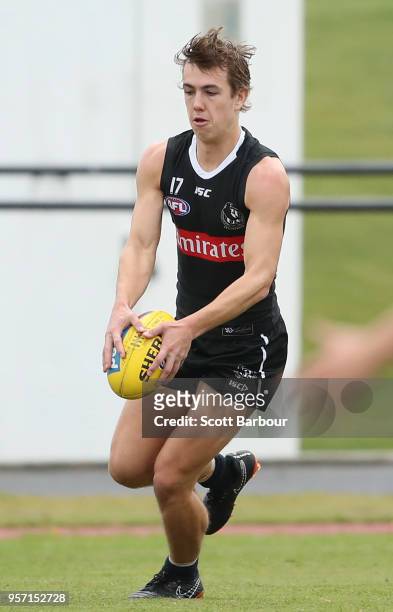Callum Brown of the Magpies runs with the ball during a Collingwood Magpies AFL media session at the Holden Centre on May 11, 2018 in Melbourne,...