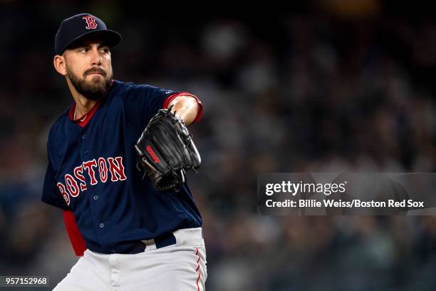 Matt Barnes of the Boston Red Sox pitches during the seventh inning of a game against the New York Yankees on May 10, 2018 at Yankee Stadium in the...
