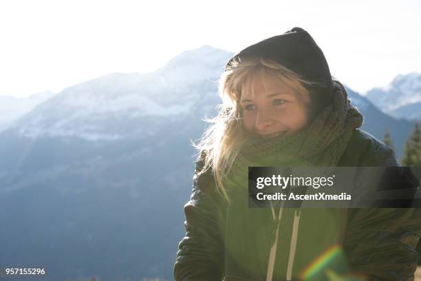 young woman walks in mountain meadow - grindelwald stock pictures, royalty-free photos & images