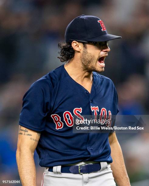 Joe Kelly of the Boston Red Sox reacts during the eighth inning of a game against the New York Yankees on May 10, 2018 at Yankee Stadium in the Bronx...