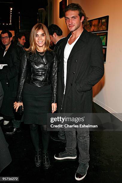 French Vogue Editor-in Chief Carine Roitfeld and socialite Stavros Niarchos attend Vladimir Restoin-Roitfeld's presentation of work by David...