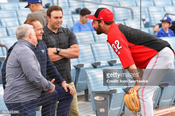 Cincinnati Reds pitcher Matt Harvey talks with agent Scott Boras before a MLB game between the Cincinnati Reds and the Los Angeles Dodgers on May 10,...