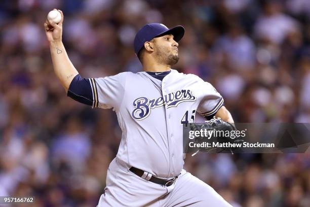 Starting pitcher Jhoulys Chacin of the Milwaukee Brewers throws in the fifth inning against the Colorado Rockies at Coors Field on May 10, 2018 in...