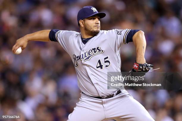 Starting pitcher Jhoulys Chacin of the Milwaukee Brewers throws in the fifth inning against the Colorado Rockies at Coors Field on May 10, 2018 in...