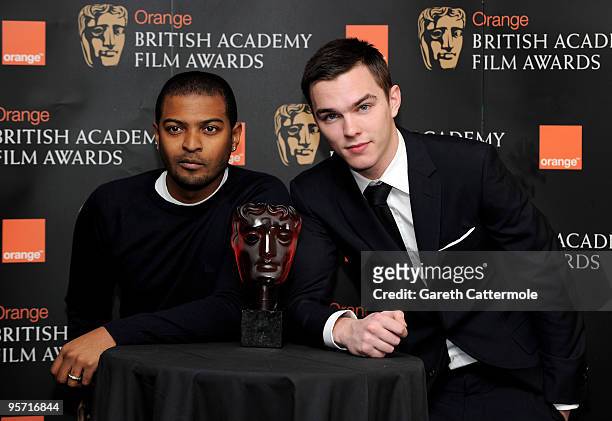 Noel Clarke and nominee Nicholas Holt pose for photographs during the BAFTA Orange Rising Star Award nomination announcement at BAFTA Headquarters on...