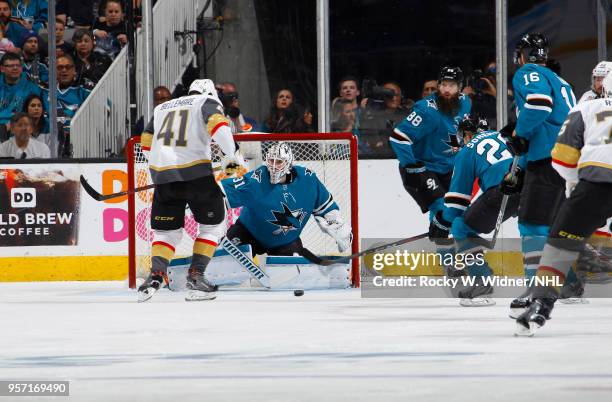 Martin Jones of the San Jose Sharks defends the net against Pierre-Edouard Bellemare of the Vegas Golden Knights in Game Six of the Western...