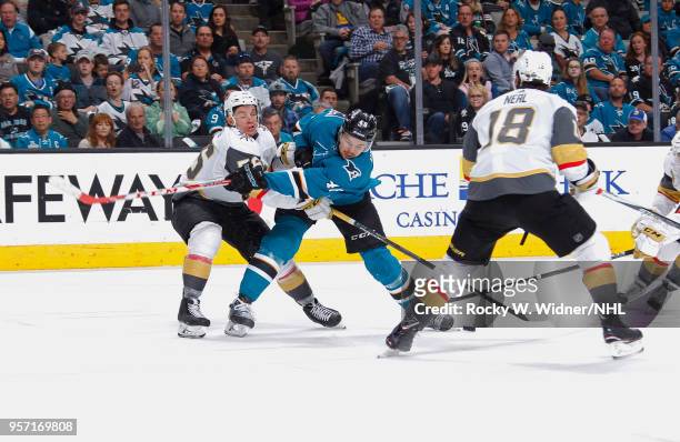 Tomas Hertl of the San Jose Sharks battles for the puck against Erik Haula of the Vegas Golden Knights in Game Six of the Western Conference Second...