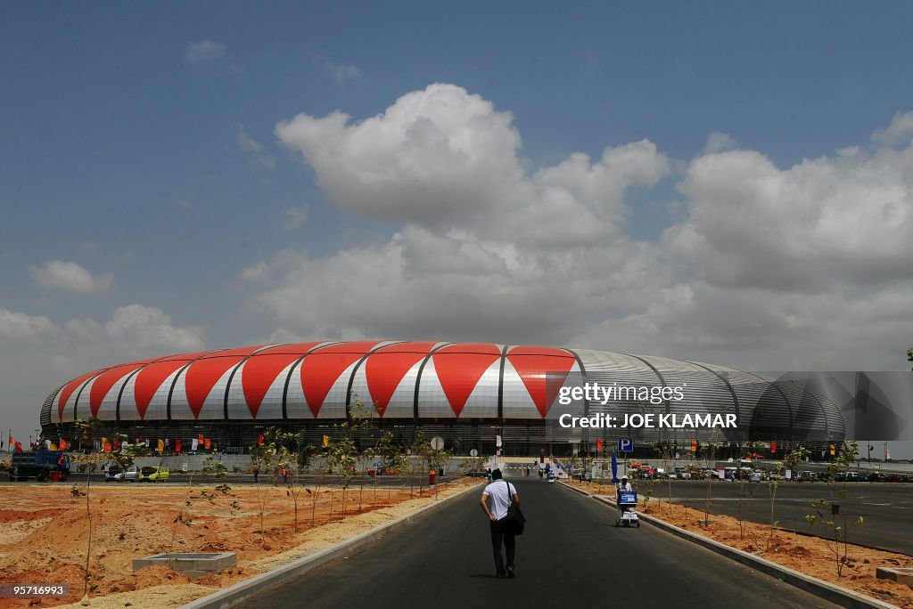 A journalist arrives to watch a match of