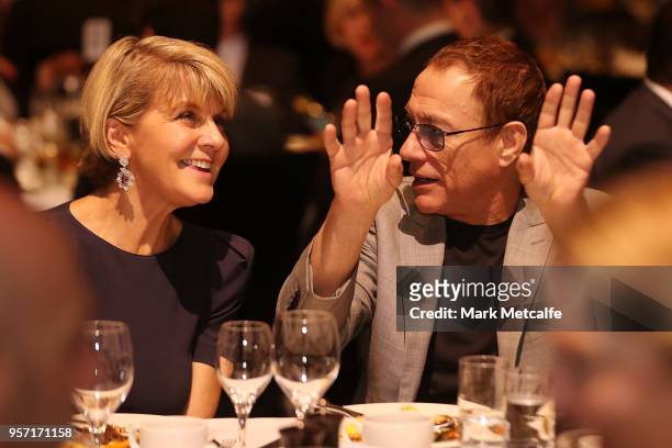 Minister for Foreign Affairs Julie Bishop talks to actor Jean-Claude Van Damme before Prime Minister Malcolm Turnbull addresses guests at the NSW...