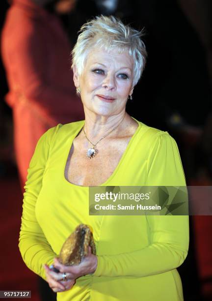 Dame Judi Dench arrives at the World Premiere of 'Nine' at Odeon Leicester Square on December 3, 2009 in London, England.