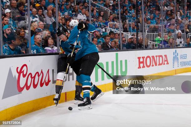 Justin Braun of the San Jose Sharks and Jonathan Marchessault of the Vegas Golden Knights battle for the puck in Game Six of the Western Conference...