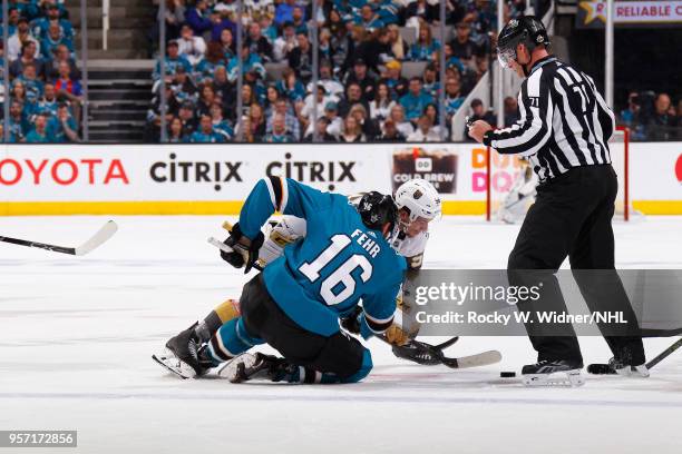 Eric Fehr of the San Jose Sharks skates after the puck against Erik Haula of the Vegas Golden Knights in Game Six of the Western Conference Second...