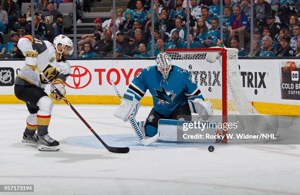 Martin Jones of the San Jose Sharks defends the net against Pierre-Edouard Bellemare of the Vegas Golden Knights in Game Six of the Western...